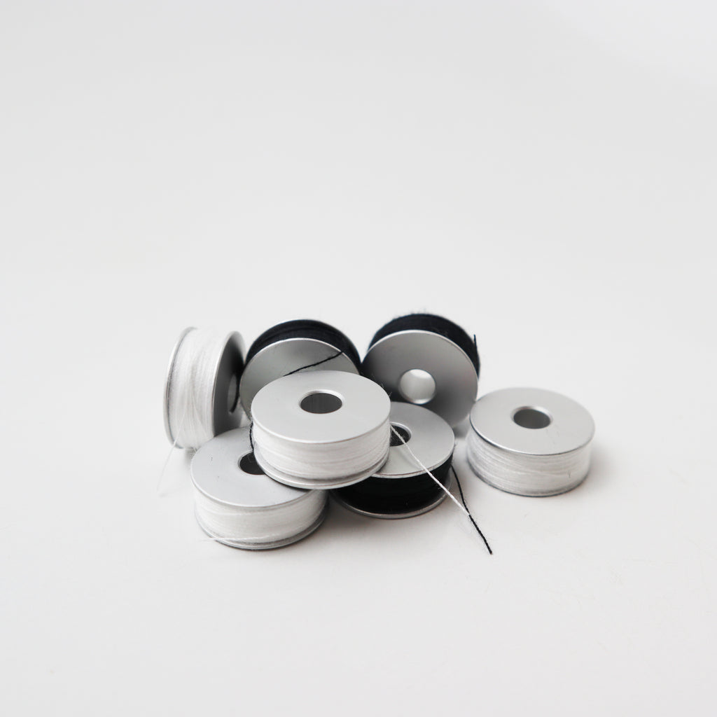 10 Pre-wounds bobbins